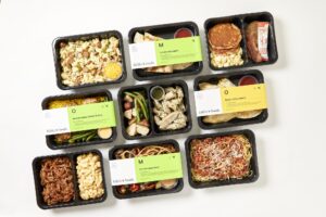 9 different high-protein prepared meals from Fitlife Foods on a white background