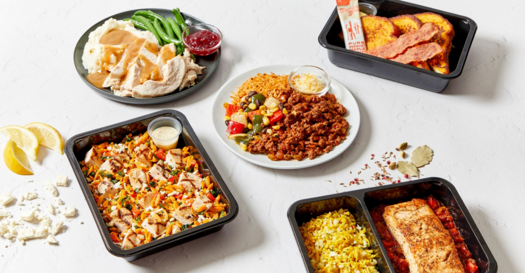 Group shot of Fitlife Foods fall menu prepared meals in containers and plates 